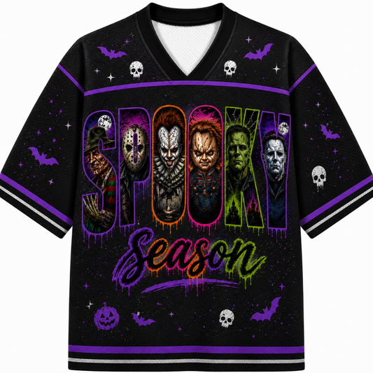 A black short-sleeve V-neck jersey with a colorful 'Spooky Season' graphic featuring horror movie character silhouettes, purple bats, skulls, and stars on a white background.