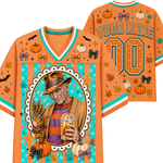 An orange Halloween-themed custom sports jersey shown from the front and back. The jersey features a colorful graphic of a spooky scarecrow in a hat holding a drink, surrounded by pumpkins, autumn leaves, stars, bats, and bows.