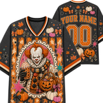 A custom Halloween-themed football jersey shown from both the front and back. The dark gray base is decorated with orange and white pumpkins, pink and white pumpkins, orange stars, and a large graphic of a creepy clown holding a candy corn bucket.