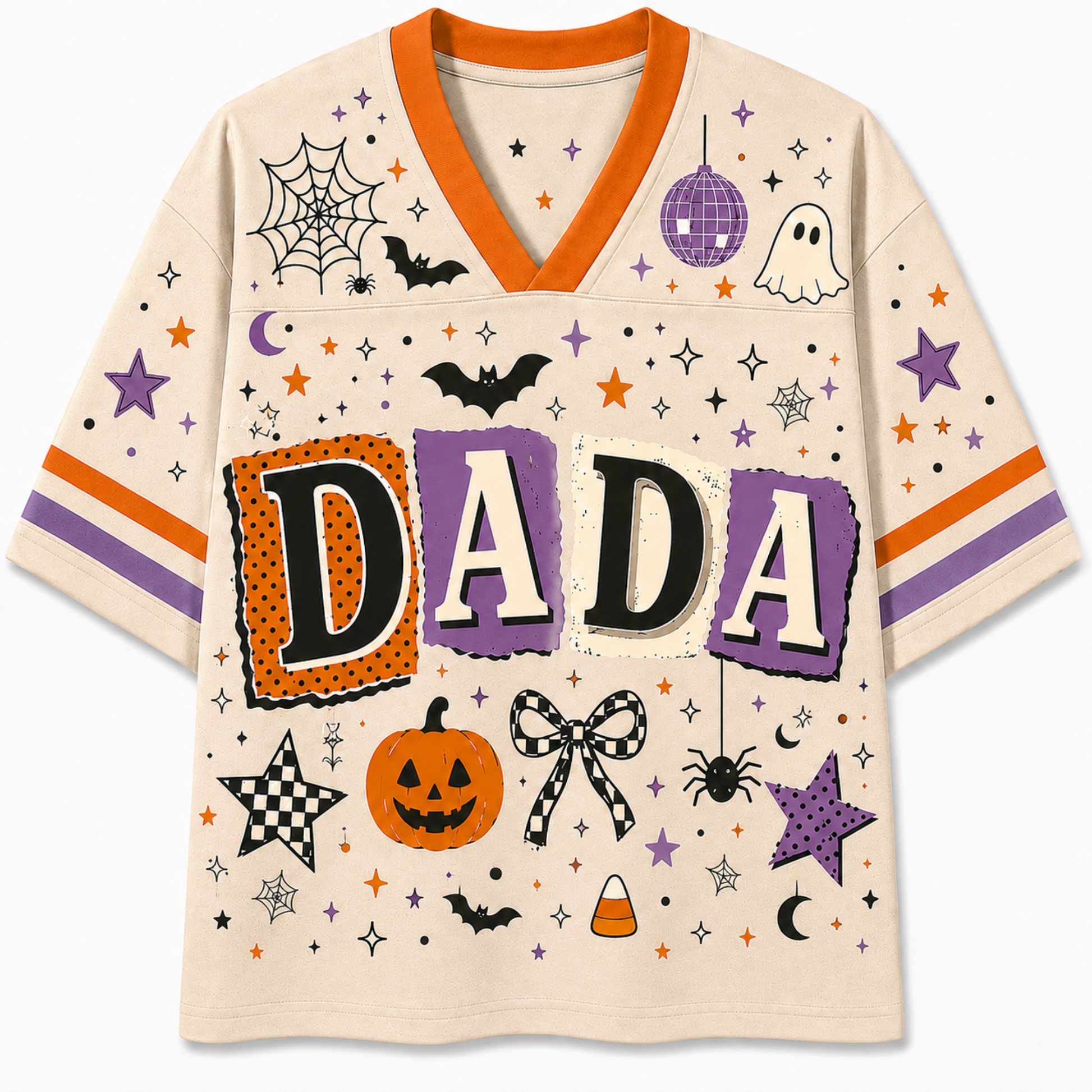 A short-sleeve V-neck t-shirt with a Halloween theme, featuring the word 'DADA' in large patch-style letters. The shirt has an off-white base with orange, purple, and black graphics, including a jack-o'-lantern, spider, ghosts, bats, stars, and moons.