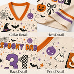 A four-panel close-up collage of a Halloween-themed cream-colored garment, showing the collar detail, hem detail, back detail with 'Spooky Dad 31' text, and a print detail with bats, a pumpkin, a ghost, stars, and orange and purple trim.