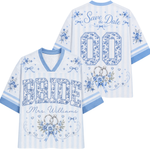 White and light blue striped V-neck sports jersey shown from the front and back, decorated with floral patterns, wedding rings, hearts, and text reading 'BRIDE', 'Save the Date', and 'Mrs. Williams'.