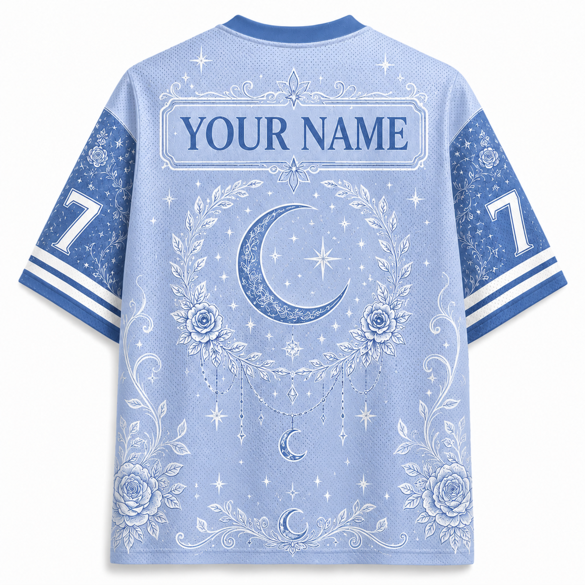 A light blue short-sleeve athletic-style shirt shown from the back, featuring a white celestial print with a crescent moon, stars, floral wreath, and the text 'YOUR NAME' across the upper back. The sleeves are blue with white number 7 graphics and striped cuffs.