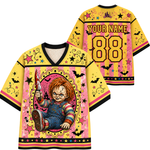 A custom hockey-style jersey shown from the front and back on a white background. The jersey features a yellow and pink Halloween theme with a graphic of Chucky holding a knife on the front, and customizable text 'YOUR NAME' and number '88' on the back.