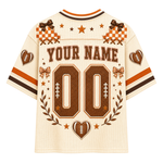 Customizable football jersey back view with 'YOUR NAME' and number '00' in brown, decorated with stars, checkered patches, heart and football motifs on an off-white mesh fabric.
