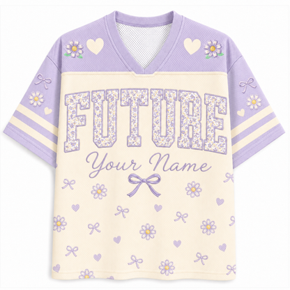 A short-sleeve V-neck athletic-style shirt in lavender and cream, featuring floral and heart motifs, striped sleeves, and the word 'FUTURE' with the text 'Your Name' on the front.
