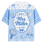 A light blue and white short-sleeve t-shirt shown from the back, featuring a 'future Mrs. Miller est.