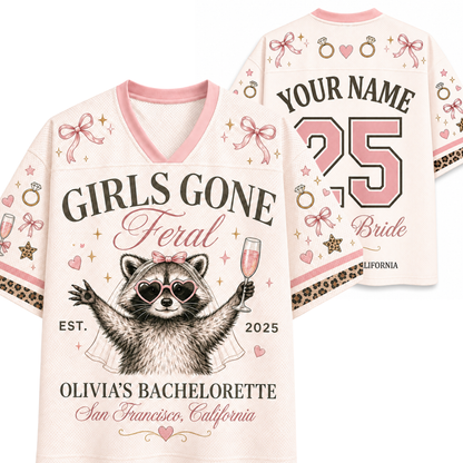 A custom bachelorette-themed graphic t-shirt shown from both the front and back. The light pink t-shirt features a raccoon wearing heart-shaped sunglasses and holding a champagne glass, with the text 'GIRLS GONE Feral' on the front and 'YOUR NAME 25 Bride' on the back.
