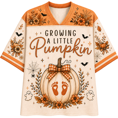 A women's short-sleeve V-neck t-shirt with a Halloween theme. The shirt features a black center panel with the text 'THERE'S A SKELLY in my belly' in white and purple, flanked by purple sleeves decorated with spiderwebs, ghosts, and jack-o'-lanterns.