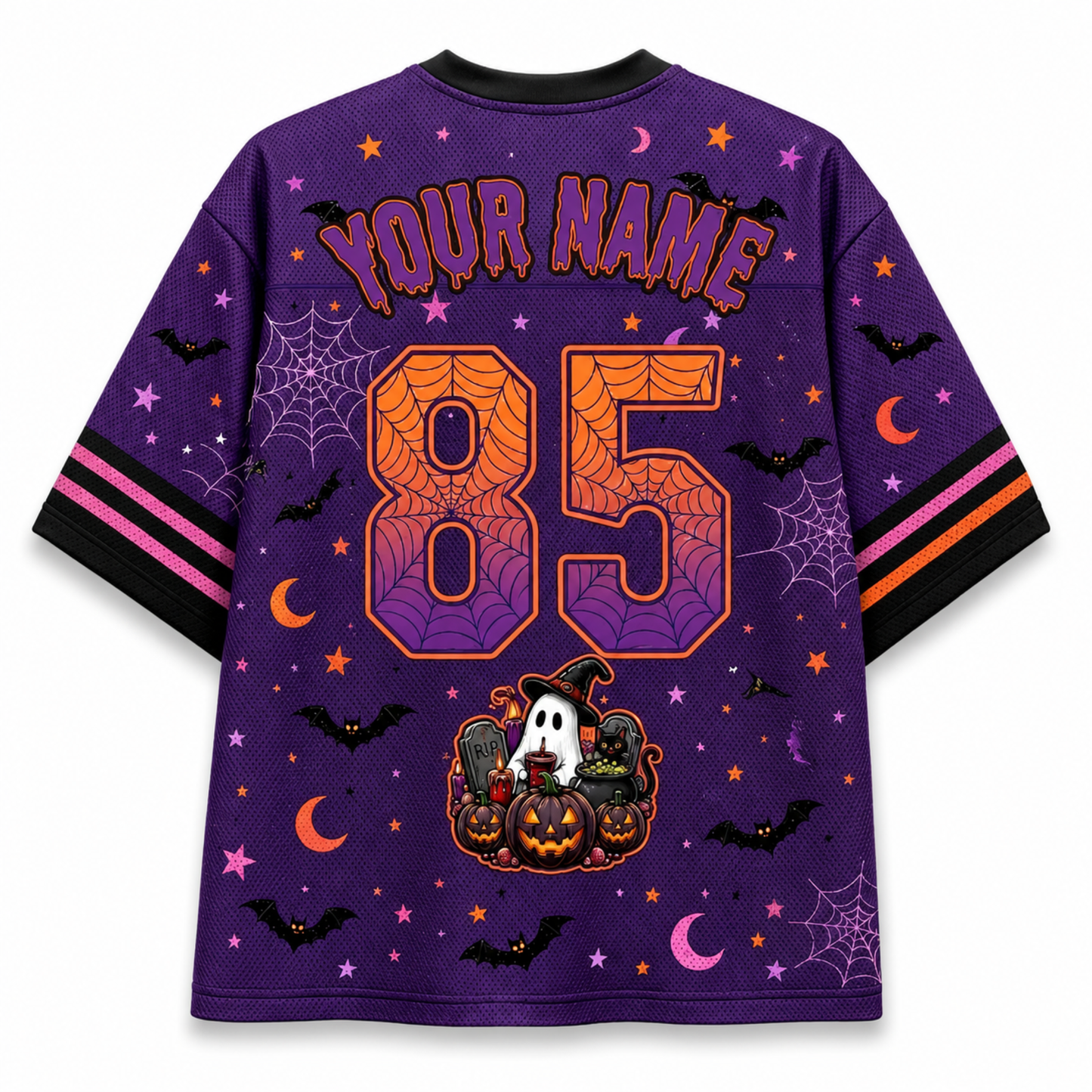 A purple short-sleeve t-shirt with a Halloween theme, featuring customizable text 'YOUR NAME' and the number '85' on the back. The design includes orange spiderwebs, black bats, pink and orange crescent moons, purple stars, spiderwebs, and a cartoon ghost and pumpkin decoration near the hem.