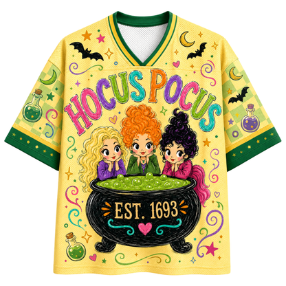 A yellow V-neck hockey-style jersey with green trim, featuring a colorful Halloween-themed graphic that reads 'HOCUS POCUS' above three cartoon witches sitting in a cauldron labeled 'EST. 1693'.