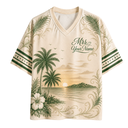 A short-sleeve V-neck jersey-style shirt in warm cream and beige with a large central tarot-card-inspired illustration reading "THE BRIDE," plus moon, star, and floral decorative motifs on the sleeves and body.