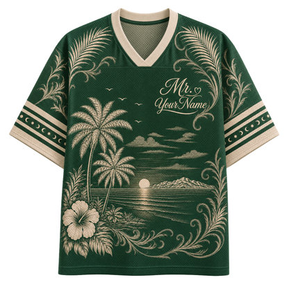 A dark green short-sleeve V-neck t-shirt with a beige tropical beach print featuring palm trees, a sunset, a hibiscus flower, and decorative scrollwork. The shirt has a mock athletic mesh texture and includes customizable text reading 'Mr.