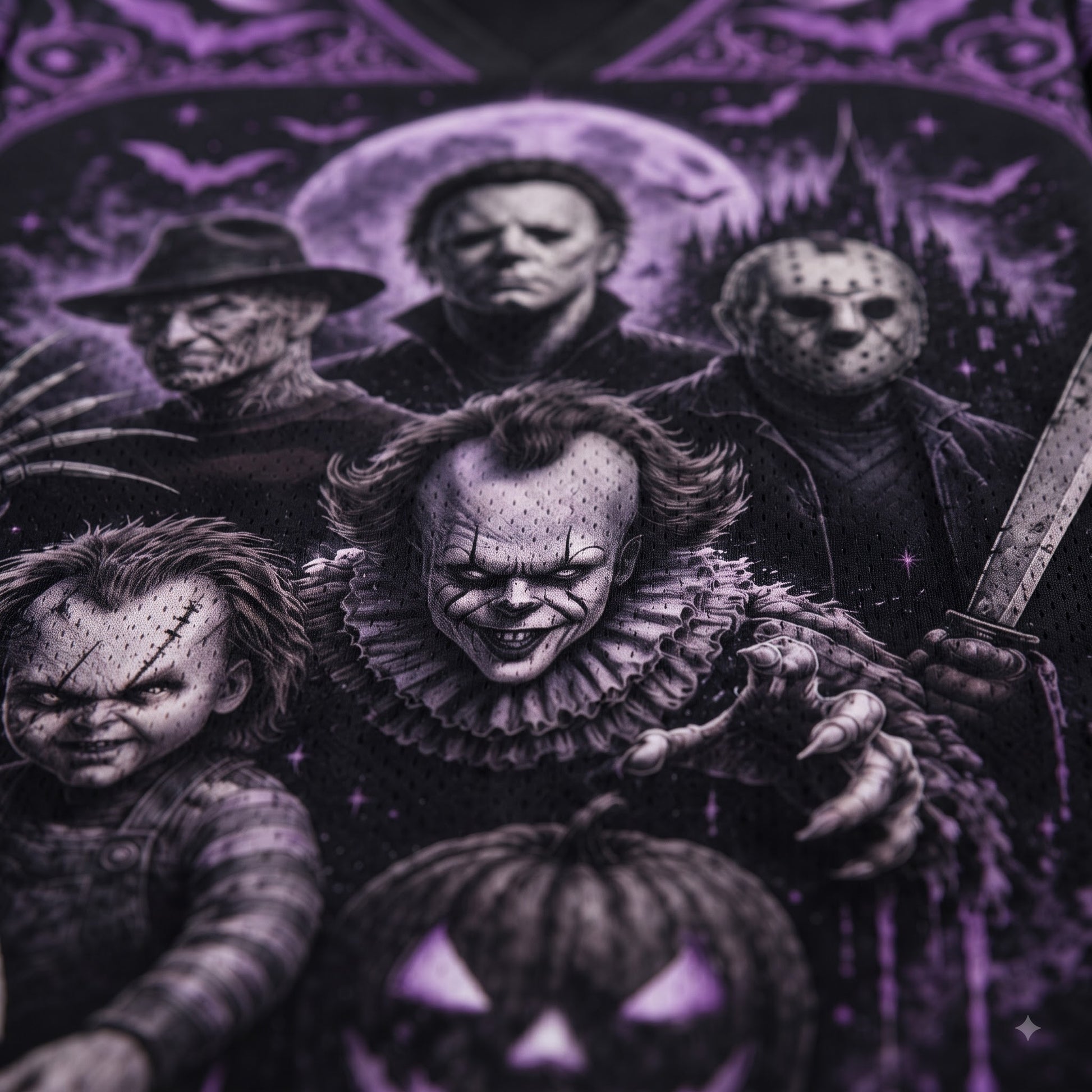 A close-up graphic print featuring horror movie villains including Michael Myers, Jason Voorhees, Pennywise, Chucky, and a pumpkin face, rendered in black, gray, and purple tones.