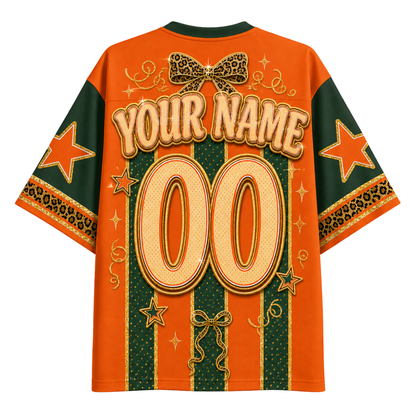 Custom orange and green short-sleeve t-shirt with 'YOUR NAME' and '00' printed on the back, featuring leopard print details and star motifs.