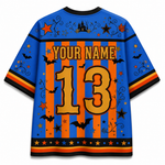A custom Halloween-themed short-sleeve jersey shown from the back, featuring a blue base with orange vertical stripes, black bats, stars, and swirls, with customizable text 'YOUR NAME' and number '13' in gold.