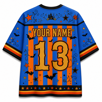 A custom Halloween-themed short-sleeve jersey shown from the back, featuring a blue base with orange vertical stripes, black bats, stars, and swirls, with customizable text 'YOUR NAME' and number '13' in gold.