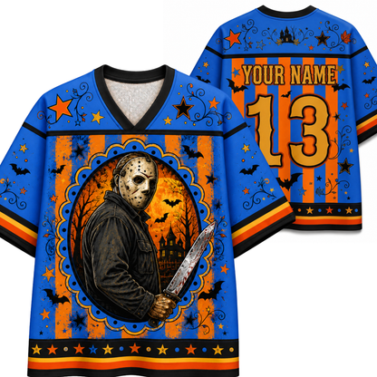 A blue and orange Halloween-themed hockey jersey shown from the front and back. The front features a graphic of a masked figure holding a bloody knife inside an oval frame, surrounded by bats, stars, and a haunted house on a striped orange and black background.
