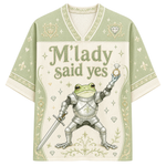 A short-sleeve V-neck t-shirt with a light sage green and cream color scheme, featuring a graphic of a knight in silver armor holding a sword and a diamond ring, with the text 'M'lady said yes' on the front.