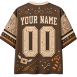 A brown short-sleeve t-shirt with a Harry Potter themed back design, featuring customizable text 'YOUR NAME' and number '00' in a beige font, surrounded by wand, broom, and lightning bolt motifs.