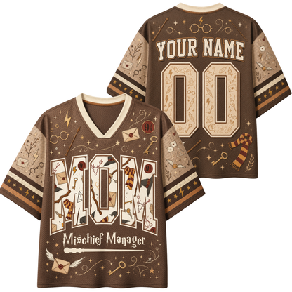Front and back views of a brown short-sleeve V-neck t-shirt with Harry Potter themed graphics, including 'Mischief Manager' text, wand, key, and owl illustrations, with customizable 'YOUR NAME' and '00' on the back.