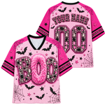 A pink Halloween-themed baseball-style jersey shown from both front and back. The front features the word 'BOO' in large rhinestone-textured letters with a fluffy faux-fur 'O', black bat silhouettes, spiderwebs, stars, and black trim.