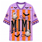 A purple and orange Halloween-themed short-sleeve V-neck jersey-style shirt with 'MIMI' printed across the front, decorated with ghosts, bats, stars, bows, and stars on a plain white background.