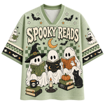 A purple and orange Halloween-themed short-sleeve V-neck jersey-style shirt with 'MAMA' printed across the front, featuring ghosts, bats, stars, bows, and polka dots.