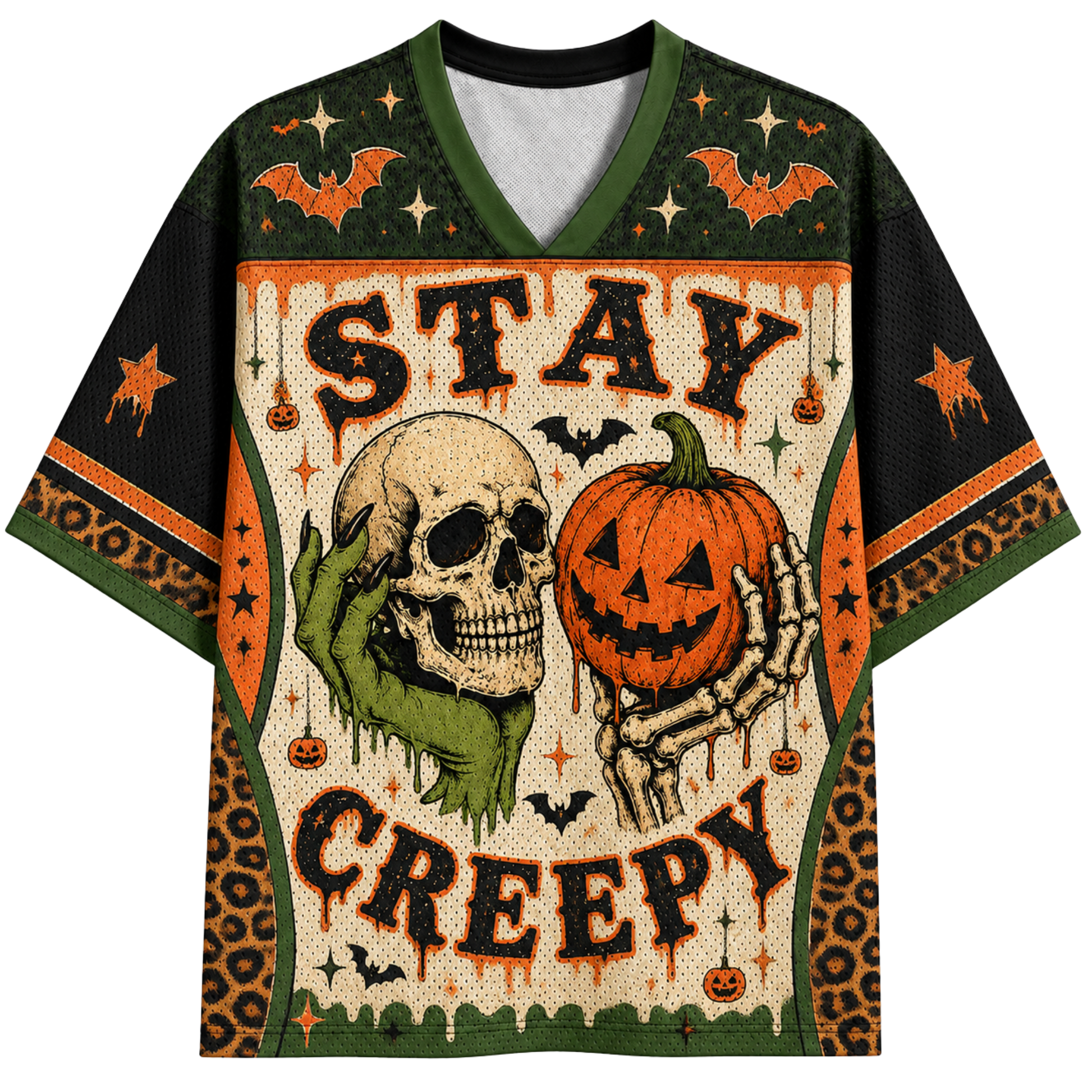 A short-sleeve V-neck jersey-style shirt with a Halloween graphic print. The design features the words 'STAY CREEPY' in dripping black letters, a green hand holding a skull, a skeleton hand holding a carved orange pumpkin, bats, stars, and leopard-print border details on a cream background.