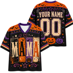 Front and back views of a customizable Halloween-themed football jersey. The jersey features a black base with orange, purple, and beige graphics, including bats, pumpkins, stars, and the word 'MAMA' spelled out in block letters.