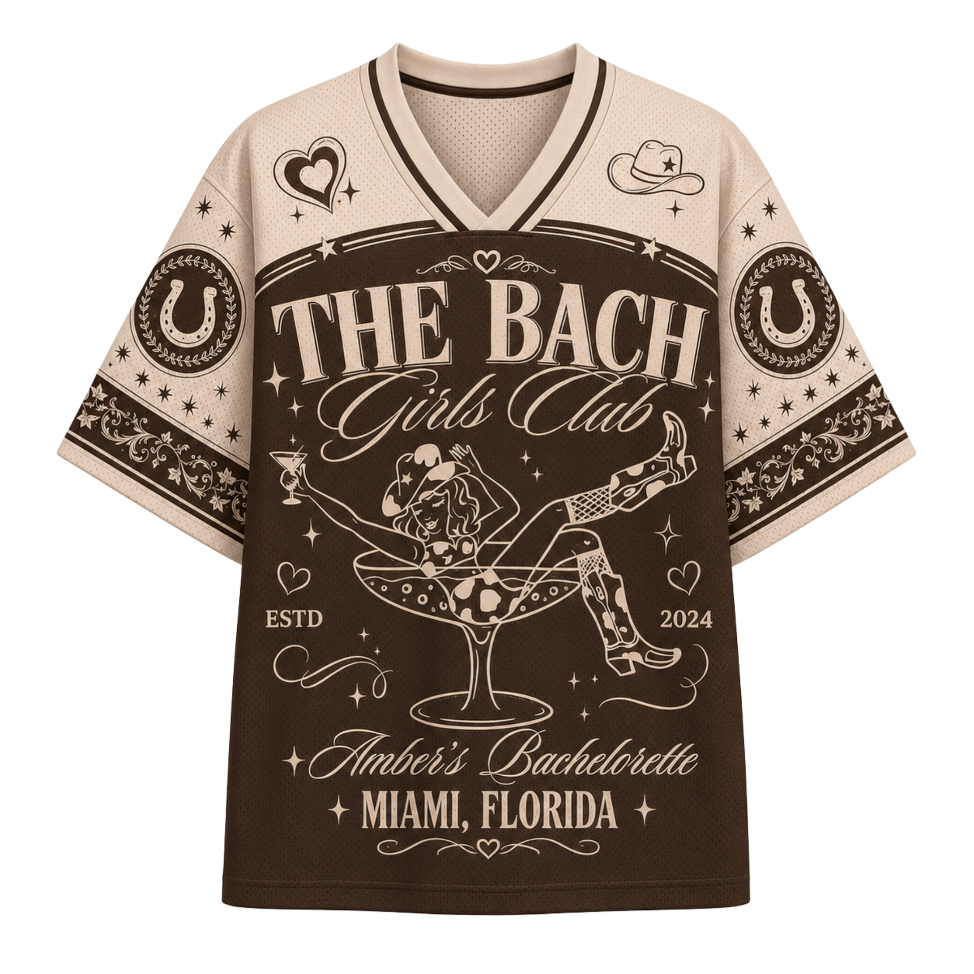 A short-sleeve V-neck t-shirt with a brown and beige graphic design. The design features the text 'THE BACH Girls Club' and 'Amber's Bachelorette Miami, Florida' with a central illustration of a woman in a martini glass.