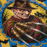 Detailed close up shot of Freddy Krueger reaching with sharp claw glove wearing fedora and striped sweater printed on yellow and blue striped mesh fabric.