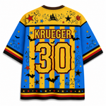 A short-sleeve sports jersey shown from the back, featuring a Halloween-themed design with blue and yellow vertical stripes, black bats, stars, and decorative swirls. The back has 'KRUEGER' and the number '30' in large yellow letters with black outlines, and a castle graphic near the upper back.