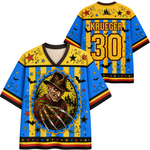 Front and back views of a colorful hockey-style jersey featuring a horror character graphic on the front, with 'KRUEGER' and the number '30' on the back. The design includes yellow, blue, black, red, and orange elements with stars, bats, and decorative swirls.