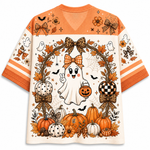 A short-sleeve V-neck t-shirt with a vibrant orange and cream Halloween theme. The shirt features a central cartoon ghost holding a jack-o'-lantern, framed by a wreath of autumn leaves, spiderwebs, leopard-print bows, pumpkins, and ghosts.