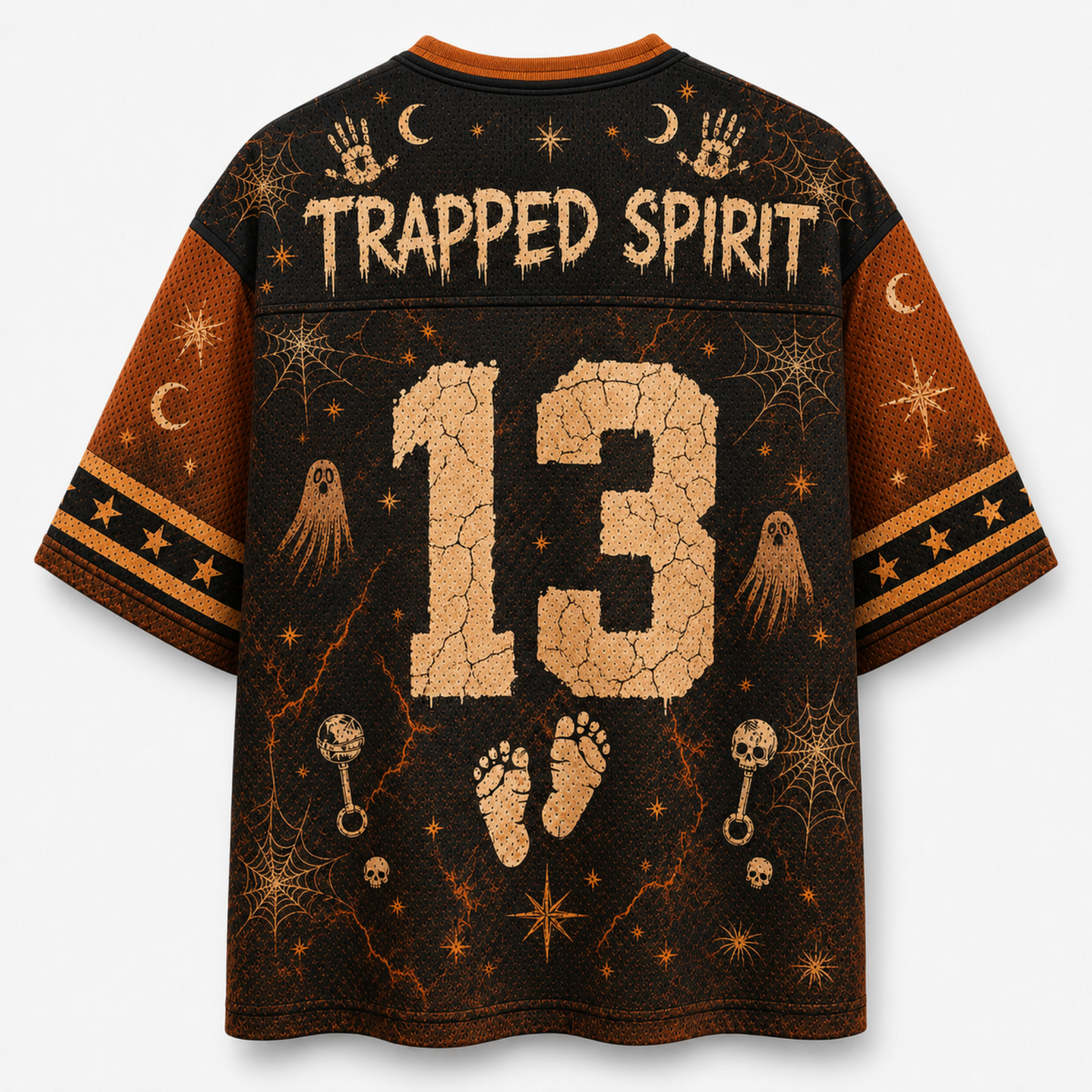 A short-sleeve graphic T-shirt shown from the back, featuring a dark brown and black Halloween-themed design with the words 'TRAPPED SPIRIT,' a large cracked beige number 13, ghosts, stars, moons, footprints, and spiderwebs. The shirt is photographed on a plain light background.